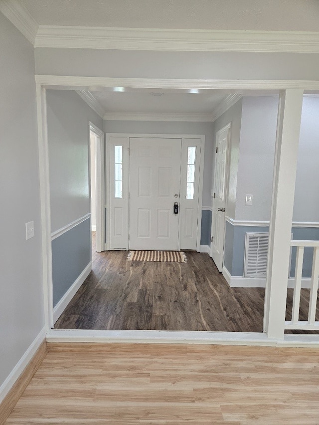 4044 Castlewood Pkwy, Columbus, GA 31907 - foyer featuring wood finished floors, baseboards, and ornamental molding