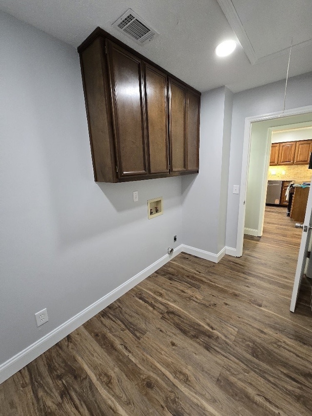 4044 Castlewood Pkwy, Columbus, GA 31907 - washroom featuring hookup for a washing machine, electric dryer hookup, cabinet space, baseboards, and attic access