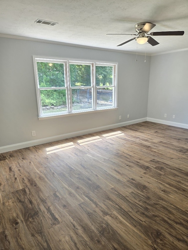 4044 Castlewood Pkwy, Columbus, GA 31907 - unfurnished room with dark wood finished floors, crown molding, ceiling fan, and baseboards