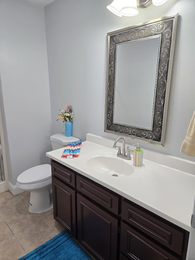 4044 Castlewood Pkwy, Columbus, GA 31907 - bathroom featuring vanity, toilet, and tile patterned floors