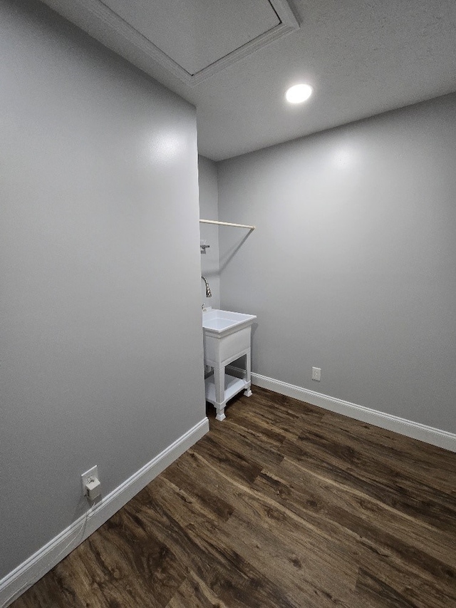 4044 Castlewood Pkwy, Columbus, GA 31907 - laundry area with dark wood-style flooring, baseboards, recessed lighting, and attic access