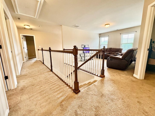 3814 Pond View Ct, Columbus, GA 31907 - corridor featuring attic access, carpet flooring, an upstairs landing, and baseboards