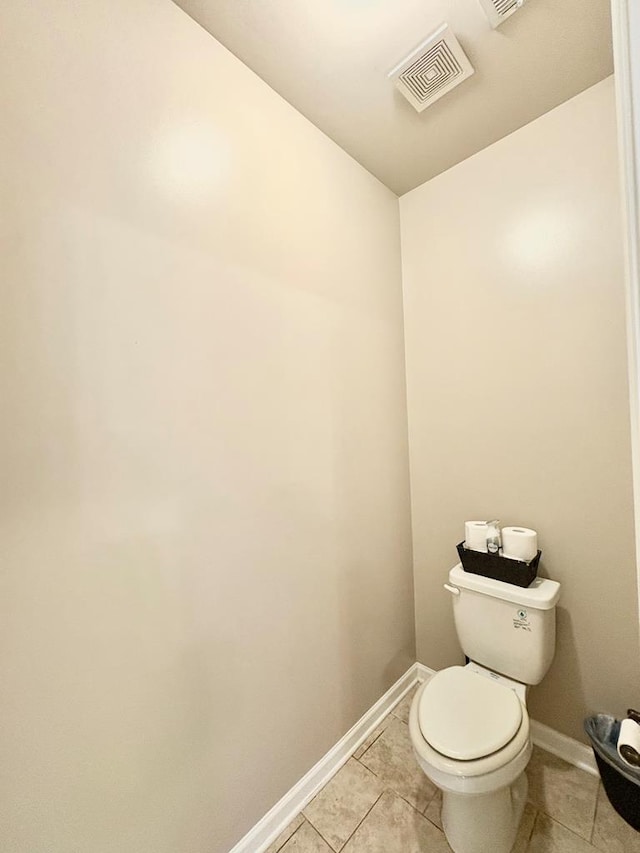 3814 Pond View Ct, Columbus, GA 31907 - bathroom with tile patterned flooring, baseboards, and toilet