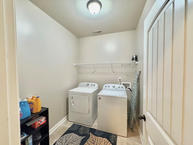 3814 Pond View Ct, Columbus, GA 31907 - laundry room featuring washer and dryer, baseboards, and tile patterned flooring