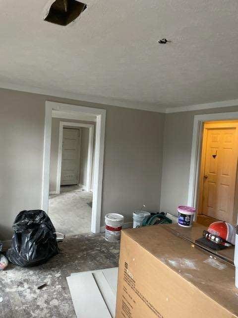 1800 18th Ct, Phenix City, AL 36867 - interior space with ornamental molding and a textured ceiling