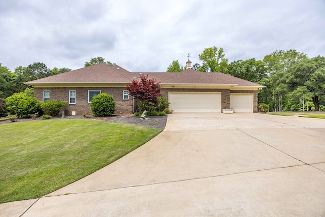 8758 Ga Highway 0315, Cataula, GA 31804 - view of front of house with driveway, a garage, a front lawn, and brick siding