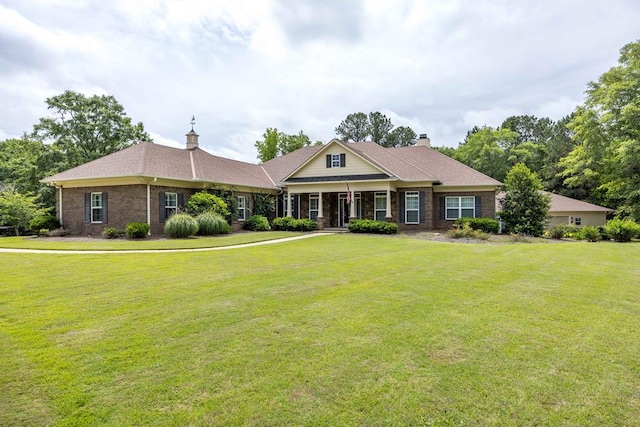 8758 Ga Highway 0315, Cataula, GA 31804 - craftsman house with a front yard, a chimney, brick siding, and covered porch