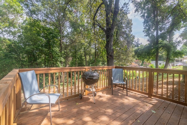 wooden deck featuring grilling area