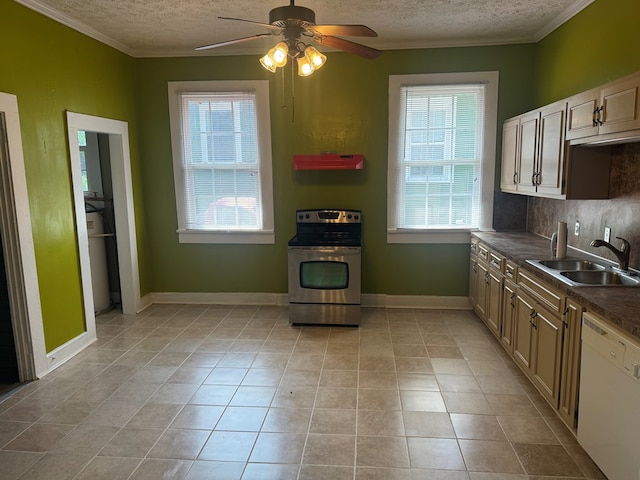 kitchen with dishwasher, stainless steel range with electric cooktop, a sink, and a textured ceiling