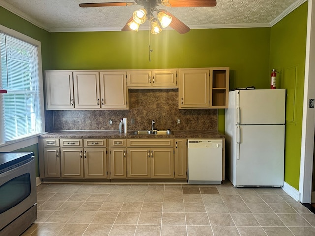 kitchen with ceiling fan, a textured ceiling, a sink, and white appliances