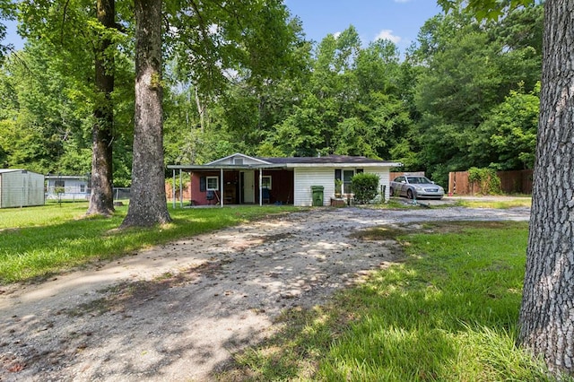 2871 Barbara Rd, Columbus, GA 31907 - ranch-style house featuring dirt driveway and covered porch