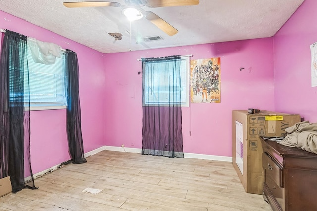 2871 Barbara Rd, Columbus, GA 31907 - bedroom featuring hardwood / wood-style floors, a textured ceiling, and a ceiling fan