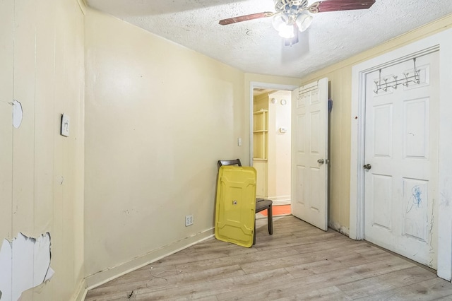 2871 Barbara Rd, Columbus, GA 31907 - unfurnished bedroom with a textured ceiling, light wood-type flooring, and ceiling fan