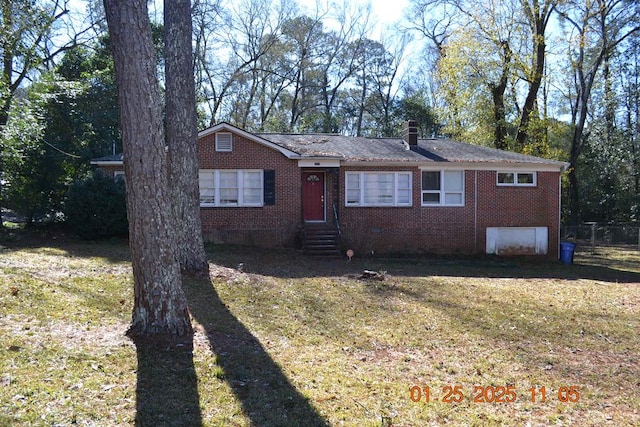 ranch-style house with a front lawn