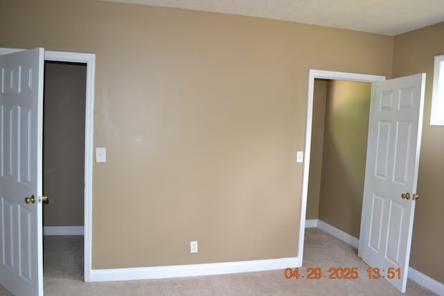 3836 Mulberry Dr, Columbus, GA 31907 - unfurnished bedroom with baseboards and light carpet