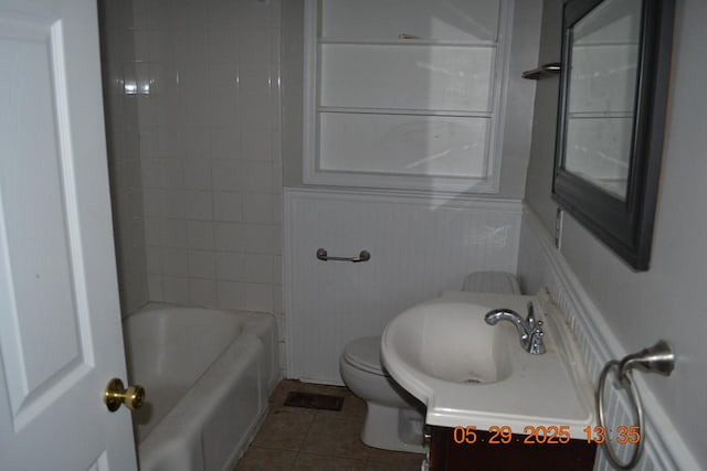 3836 Mulberry Dr, Columbus, GA 31907 - full bath with vanity, tile patterned flooring, toilet, and wainscoting