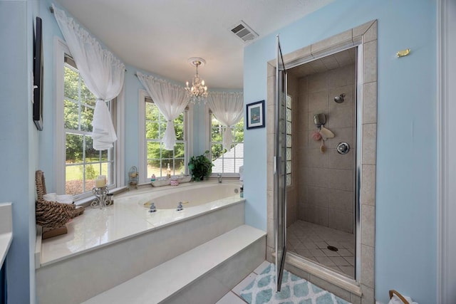 12225 County Line Rd, Midland, GA 31820 - full bath with a shower stall, a chandelier, and a bath