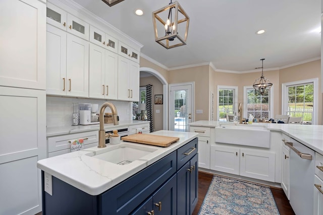 12225 County Line Rd, Midland, GA 31820 - kitchen featuring a chandelier, a sink, an island with sink, white cabinetry, and blue cabinets