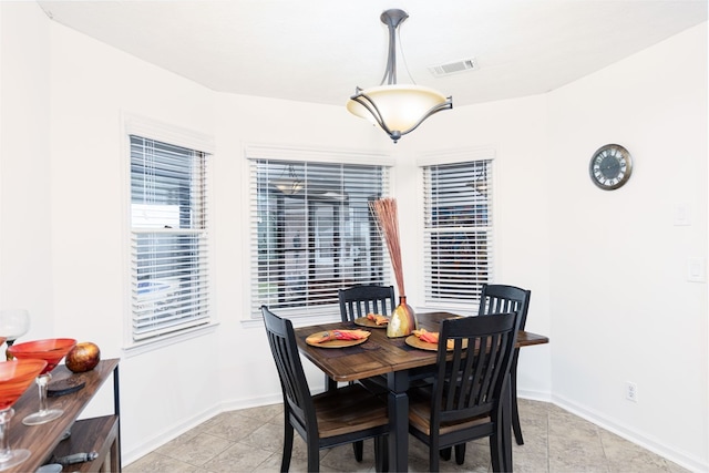 4524 Hedingham Ln, Columbus, GA 31907 - dining space featuring baseboards and light tile patterned flooring