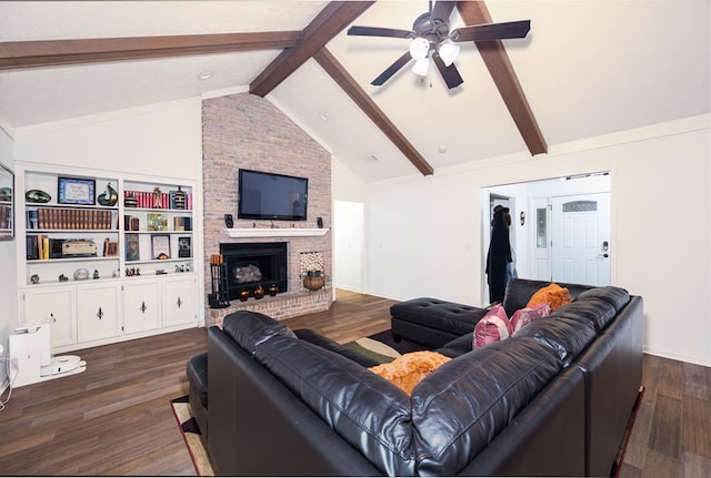 4524 Hedingham Ln, Columbus, GA 31907 - living room with beam ceiling, dark wood-type flooring, a ceiling fan, a brick fireplace, and high vaulted ceiling