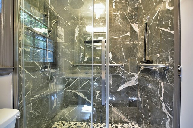 1237 Smith Rd, Fortson, GA 31808 - full bathroom with a marble finish shower and toilet