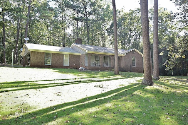 1237 Smith Rd, Fortson, GA 31808 - single story home featuring brick siding, a front yard, and a chimney