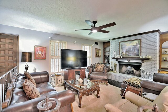 carpeted living room featuring a fireplace, a textured ceiling, and ceiling fan