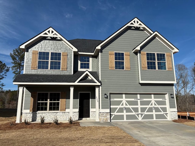 craftsman inspired home featuring a garage