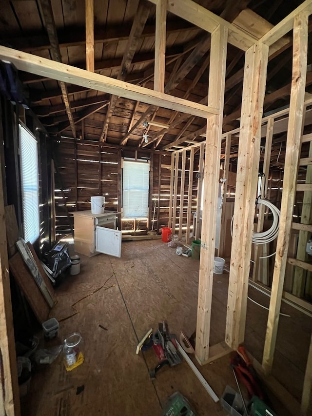 misc room with lofted ceiling