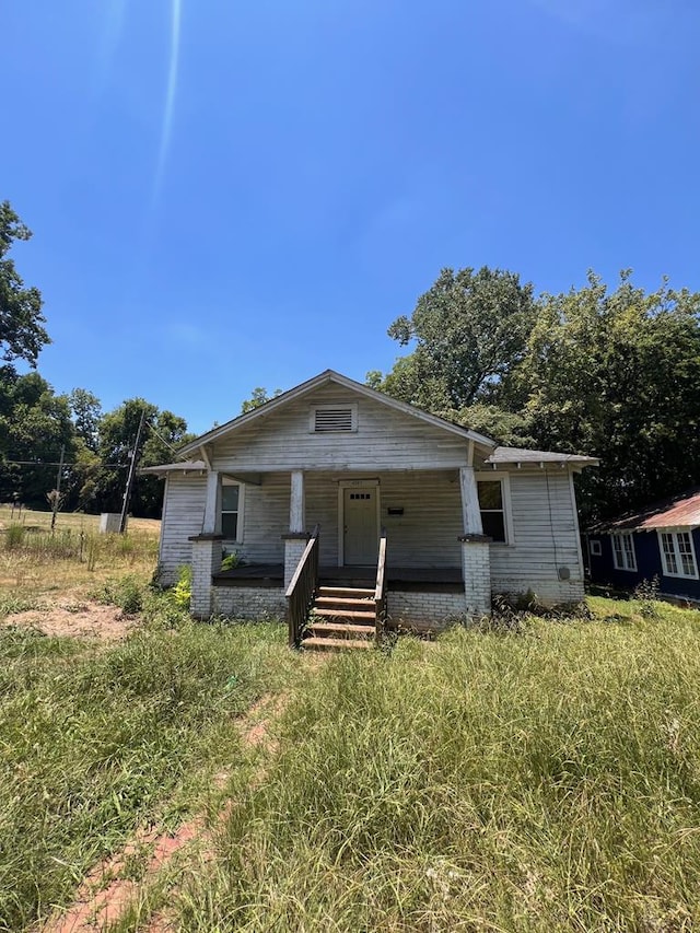 bungalow featuring covered porch