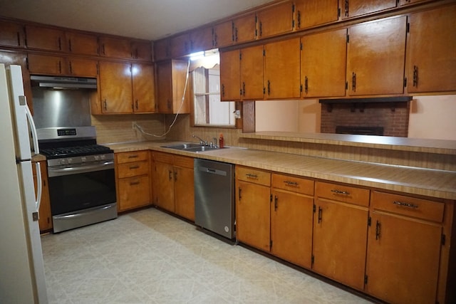 kitchen with appliances with stainless steel finishes and sink