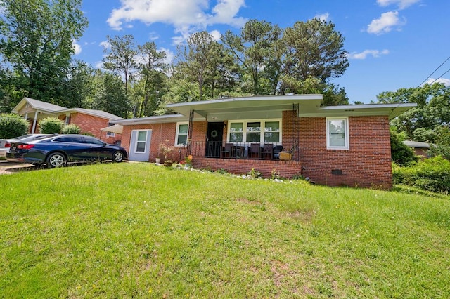 4512 Lunsford St, Columbus, GA 31903 - ranch-style home featuring a porch, a front yard, and brick siding