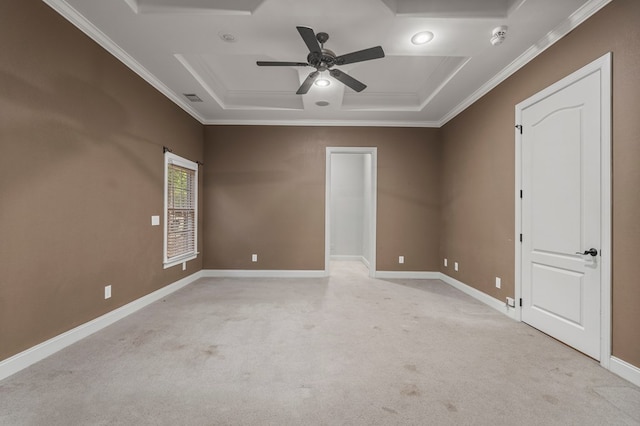 unfurnished room with ornamental molding, light carpet, a ceiling fan, and visible vents