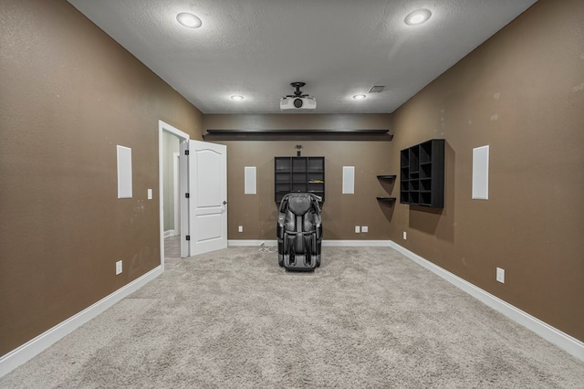interior space featuring baseboards, carpet flooring, and recessed lighting