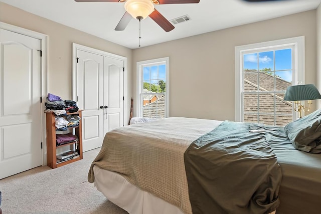 4256 Anglin Rd, Columbus, GA 31907 - carpeted bedroom featuring multiple windows, a closet, and a ceiling fan