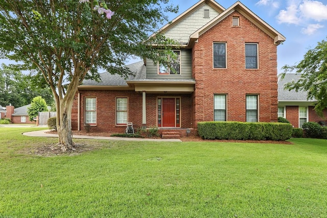 4256 Anglin Rd, Columbus, GA 31907 - view of front of home featuring a front yard, brick siding, and a shingled roof