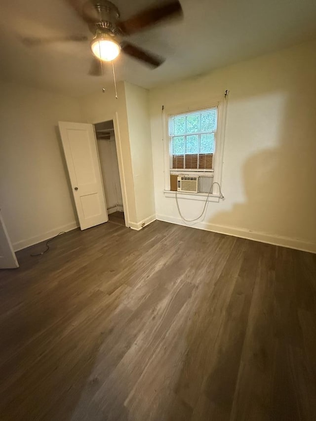 2436 Schaul St, Columbus, GA 31906 - unfurnished bedroom featuring baseboards, dark wood-style floors, ceiling fan, and cooling unit