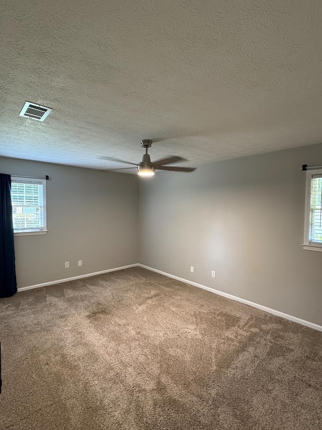4901 Willowbrook Dr, Columbus, GA 31909 - carpeted empty room featuring ceiling fan and a textured ceiling