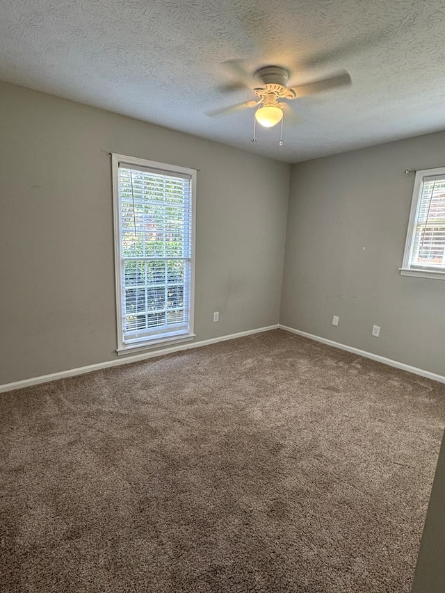 4901 Willowbrook Dr, Columbus, GA 31909 - spare room featuring a ceiling fan, carpet, and a textured ceiling