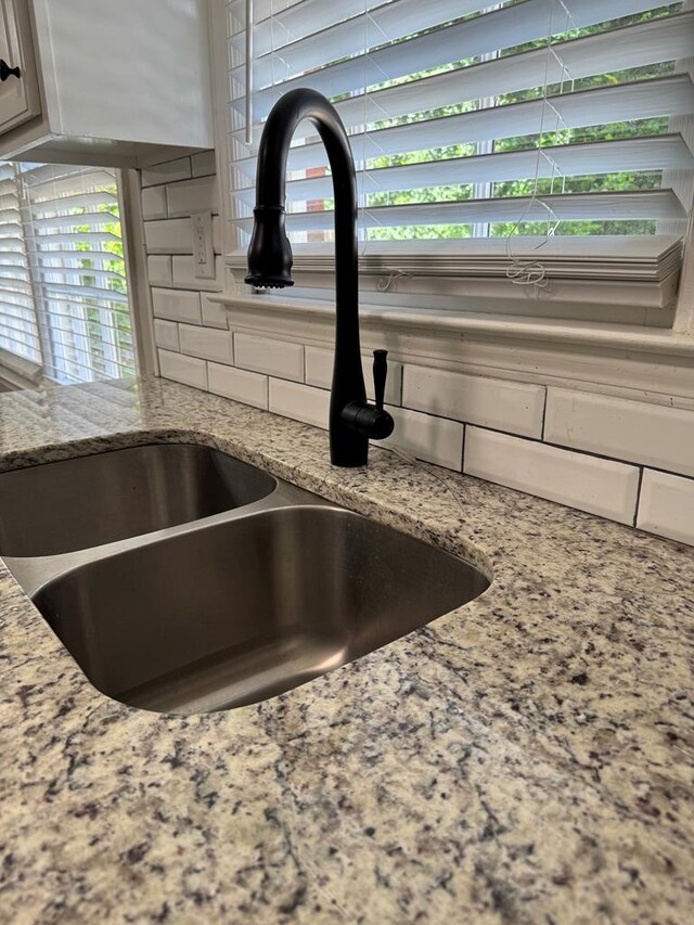 4901 Willowbrook Dr, Columbus, GA 31909 - kitchen view of tasteful backsplash and light stone counters