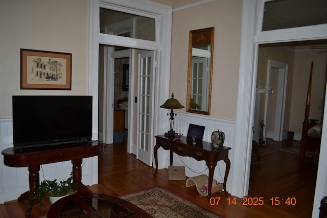 2901 Beacon Ave, Columbus, GA 31904 - living area with wood finished floors, wainscoting, and a decorative wall