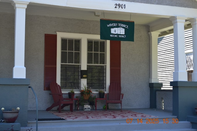 2901 Beacon Ave, Columbus, GA 31904 - view of exterior entry featuring stucco siding and covered porch