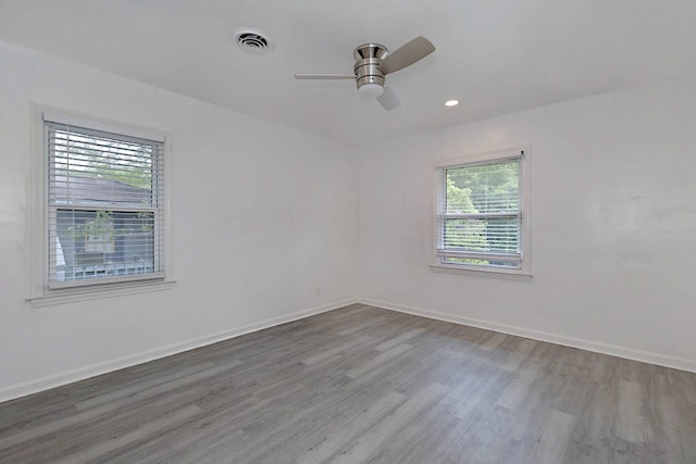 4657 Pate Dr, Columbus, GA 31907 - empty room with wood finished floors, visible vents, a ceiling fan, and baseboards