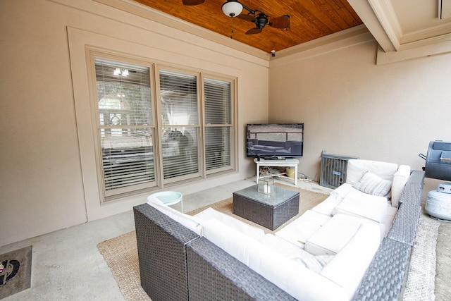 view of patio featuring an outdoor living space and ceiling fan