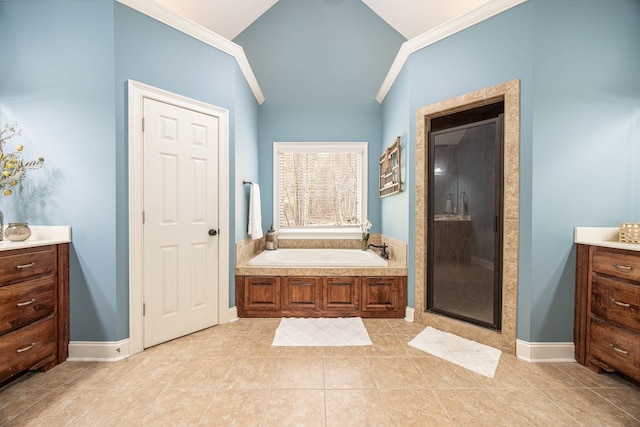 full bathroom featuring vanity, a garden tub, baseboards, a shower stall, and crown molding