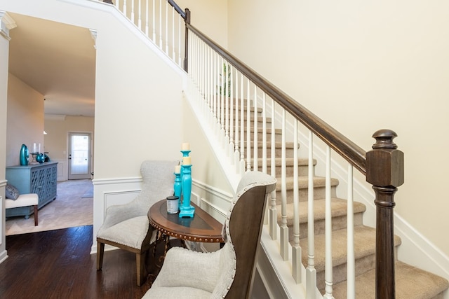 staircase featuring hardwood / wood-style flooring