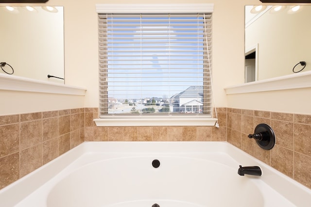 bathroom featuring a washtub