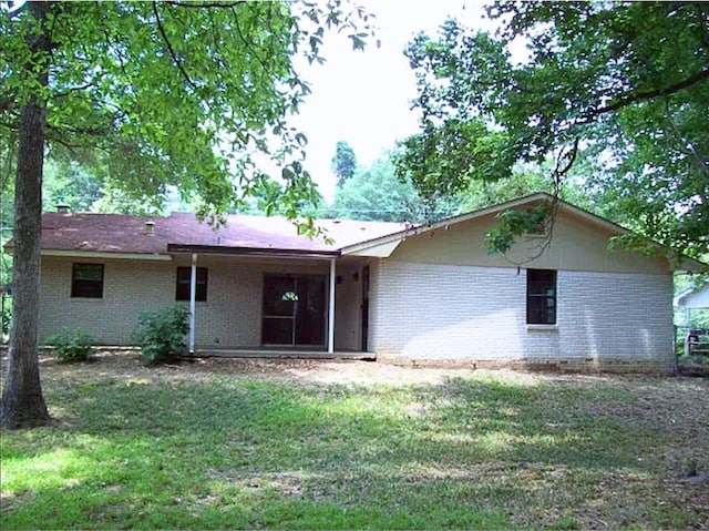 920 Ashland Ave, Columbus, GA 31907 - view of front of home with brick siding and a front yard