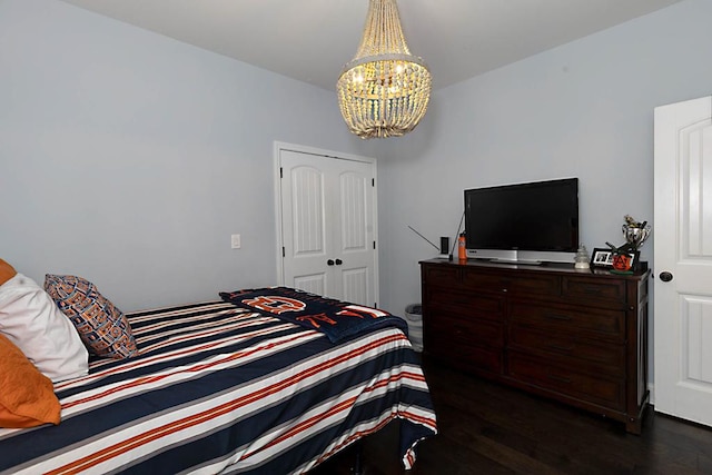 1537 Magnolia Way, Columbus, GA 31904 - bedroom featuring a chandelier, dark wood-style flooring, and a closet