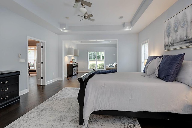 1537 Magnolia Way, Columbus, GA 31904 - bedroom featuring a raised ceiling, dark wood-style floors, and a ceiling fan